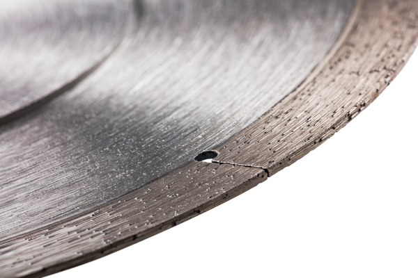 Close-up of a circular saw blade with visible teeth.