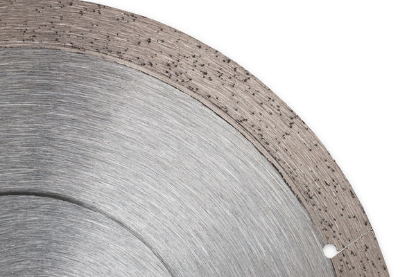 Close-up of a circular saw blade with visible teeth.