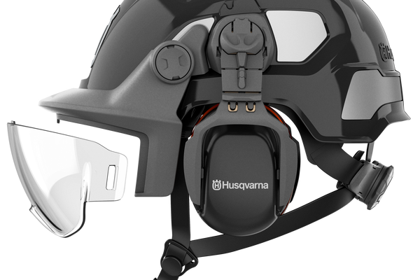 Side view of a Husqvarna safety helmet with ear protection and visor.