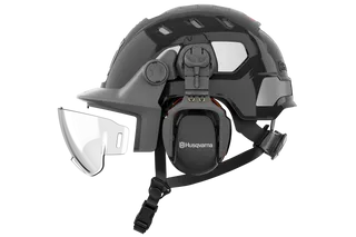 Side view of a Husqvarna safety helmet with ear protection and visor.