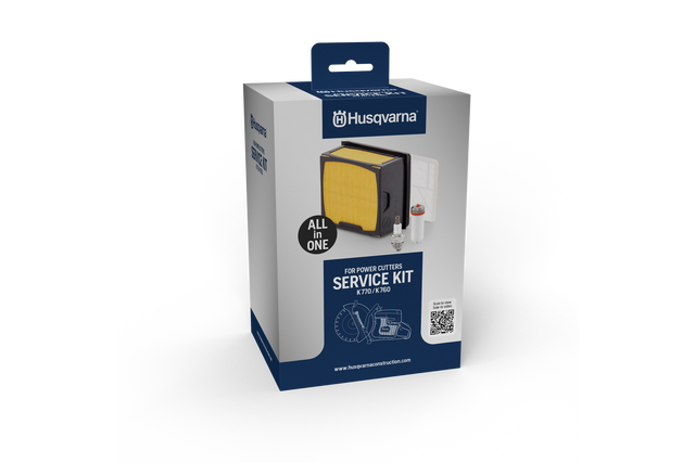 Front view of a Husqvarna service kit box for power cutters, featuring a spark plug and filter.