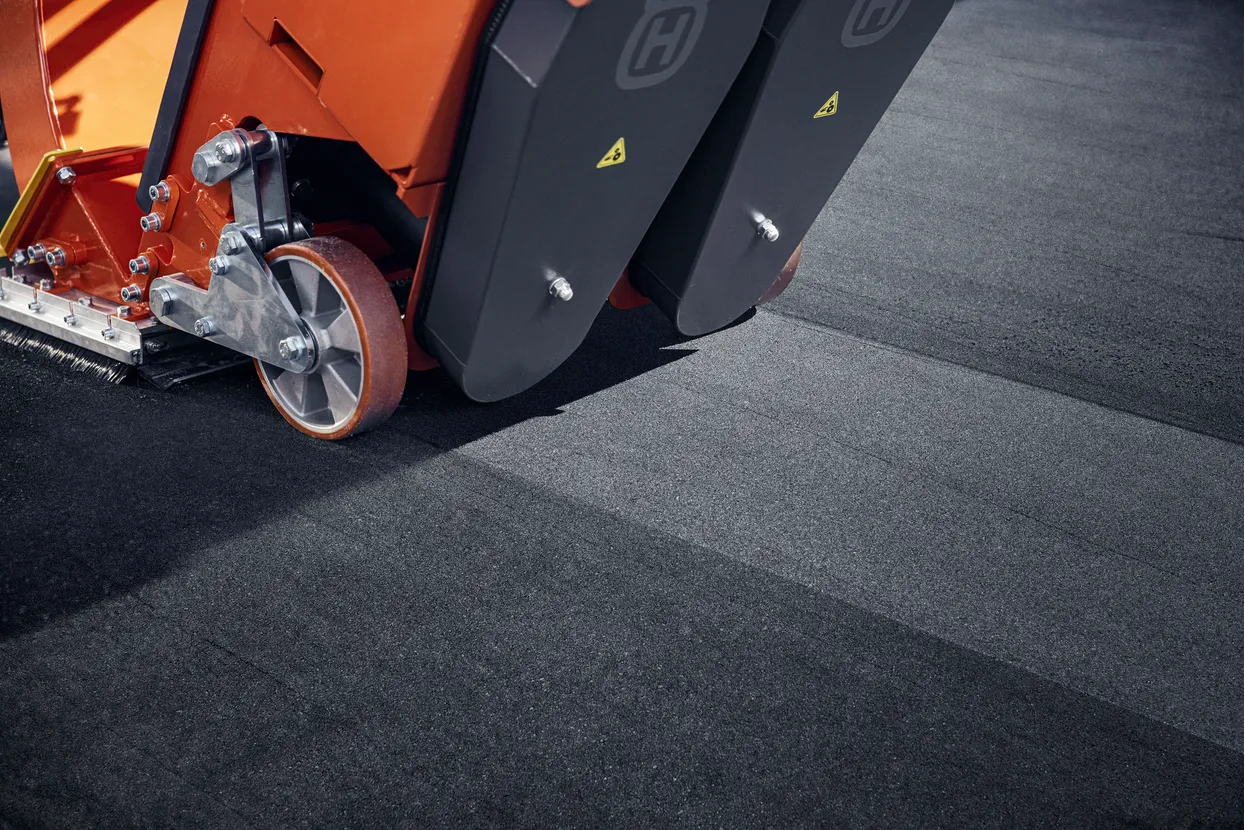 SHOT BLASTING OF ASPHALT, CLOSE UP