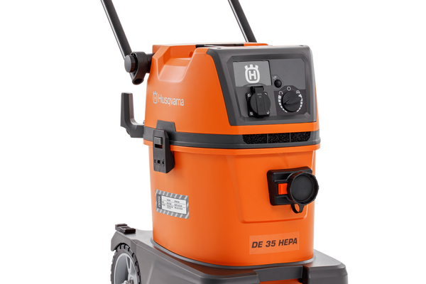 Side view of a Husqvarna DE 35 HEPA dust extractor with wheels and handle.